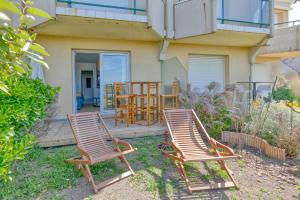 Appartements Appartement Cosy face a la mer : photos des chambres