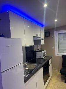 Villas Superbe Villa toute equipee ! : photos des chambres