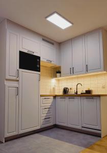 City Center Pereca, next to Warsaws Business District & Metro ONZ, by WarsawSkyLine Apartments