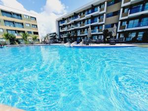 Flat em Muro Alto - Porto de Galinhas - MANA D306 - By Anfitrião Legal