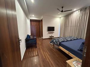 Divine Stay-3BHK,AC,WiFi,Kitchen