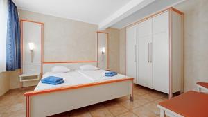 Three-Bedroom Apartment with Terrace (6 Adults) room in Village de Vacances les Tourelles