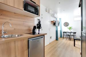 Appartements Charming 1 Bedroom - Romainville 1 : photos des chambres