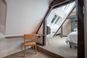 Cote Paradis - Appartements de Charme au centre-ville de Beaune : photos des chambres