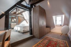 Cote Paradis - Appartements de Charme au centre-ville de Beaune : photos des chambres