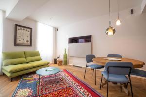 Cote Paradis - Appartements de Charme au centre-ville de Beaune : photos des chambres