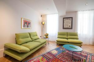 Cote Paradis - Appartements de Charme au centre-ville de Beaune : photos des chambres