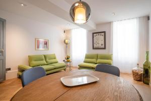 Cote Paradis - Appartements de Charme au centre-ville de Beaune : photos des chambres