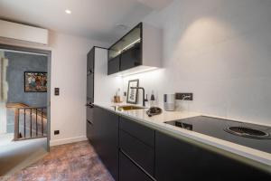 Cote Paradis - Appartements de Charme au centre-ville de Beaune : photos des chambres