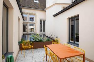 Cote Paradis - Appartements de Charme au centre-ville de Beaune : photos des chambres