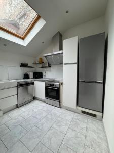 Appartements Maison de ville proche du port au coeur du Carre des Arts de Honfleur : photos des chambres