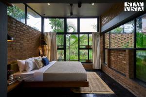 StayVista at Rustic Haven with Pvt Pool, Gazebo & Indoor-Outdoor Game