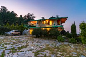 StayVista at The Woods with Indoor Fireplace & BBQ