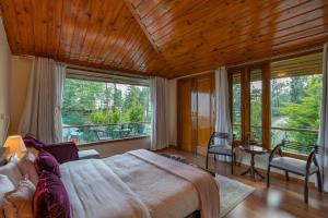 StayVista at The Woods with Indoor Fireplace & BBQ