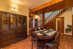 StayVista at The Woods with Indoor Fireplace & BBQ