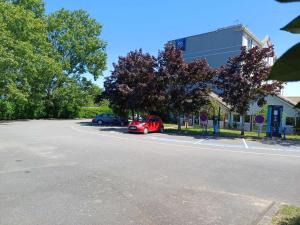 Hotels Hotel Ibis Budget Nantes Ouest Atlantis Coueron : photos des chambres