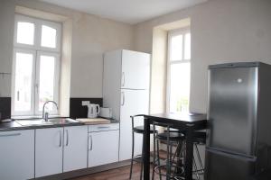 Appartements La Maison du Port, vue mer, jardin et parking : photos des chambres