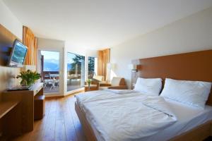 Superior Double Room with Balcony and Mountain View room in Hotel Helvetia Intergolf