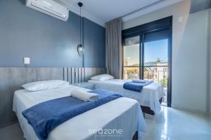 UML - Apartamentos quadra mar em Bombinhas