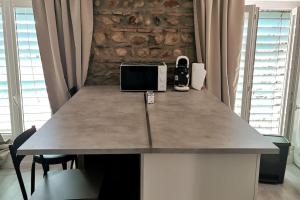 Appartements Studio coquet avec vue : photos des chambres