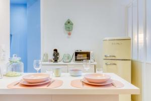 Appartements La Confiserie - Lumineux - Atypique : photos des chambres