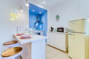 Appartements La Confiserie - Lumineux - Atypique : photos des chambres