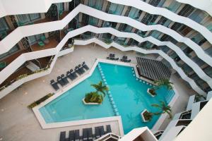 Downtown stylish 2BR with large terrace pool gym and bar