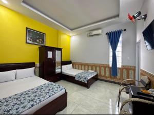Phòng có 2 Giường đơn với Máy lạnh (Twin Room with Air-Conditioning)