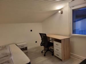 Appartements Au calme - Maison duplex Parking : photos des chambres
