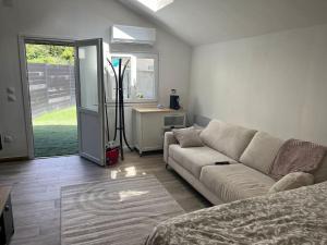 Maisons de vacances Maisonnette avec terrasse avec spa privatif : photos des chambres