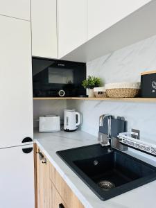 Hevenia Pogorzelica Meeresrauschen Apartment am Strand -SUNNY SIDE BALTIC-