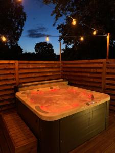 Family apartment with hot tub-outdoor area and sauna