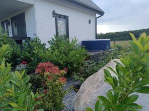 Domki Anielski Zakątek J&R nad Bałtykiem DELUX z balią ogrodową z jacuzzi i klimatyzacją