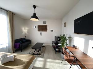 Appartements Grand studio calme avec balcon & parking gratuit : photos des chambres