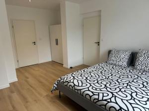 Appartements Appartement VII - Haut Standing : photos des chambres