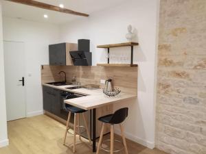 Appartements Cite de la Gastronomie : photos des chambres