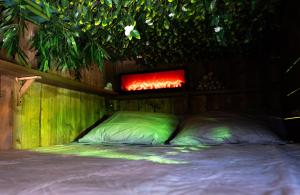 Maisons d'hotes Les Chambres de Paulette a Theme LA JUNGLE ROOM : photos des chambres