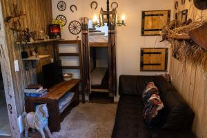 Maisons d'hotes Les Chambres de Paulette a Theme LE RANCH : photos des chambres