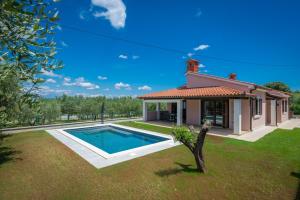 Olive tree oasis with heated pool