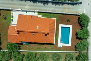 Olive tree oasis with heated pool