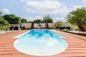 Maisons de vacances La Maison Paradis - Piscine privee et chauffee : photos des chambres