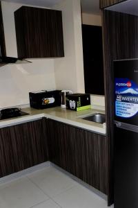 Spacious 3 Bedrooms with wifi access and pool near SM MOA Arena