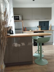 Appartements Studio au calme avec jardin : photos des chambres