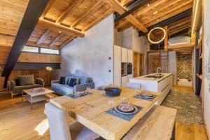 Appartements La Ferme a Roland ski in - ski out - Happy Rentals : photos des chambres