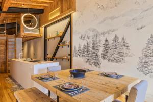 Appartements La Ferme a Roland ski in - ski out - Happy Rentals : photos des chambres
