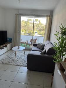 Appartements Appartement lumineux climatise avec terrasse : photos des chambres