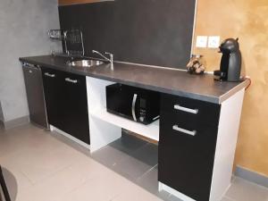 Appartements Charmant studio a Baixas de 30 m² avec Jacuzzi : photos des chambres