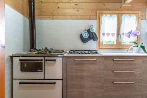 Chalet Al Sasso da Pino, Telve Ospitar