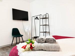 Appartements Le London, studio proche aeroport : photos des chambres