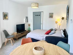 Appartements Le chaurien - central et climatise - local velo : photos des chambres